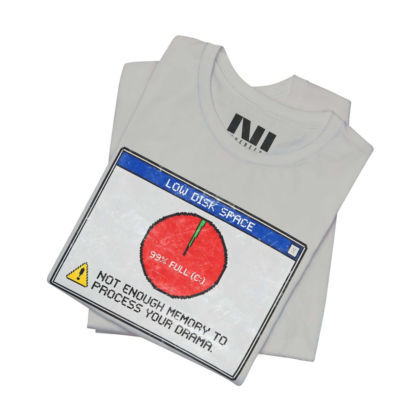 folded Heather athletic gray graphic t-shirt featuring a retro computer error message that reads "Not enough memory to process your drama" with a 99% full disk pie chart icon. #Athletic Heather