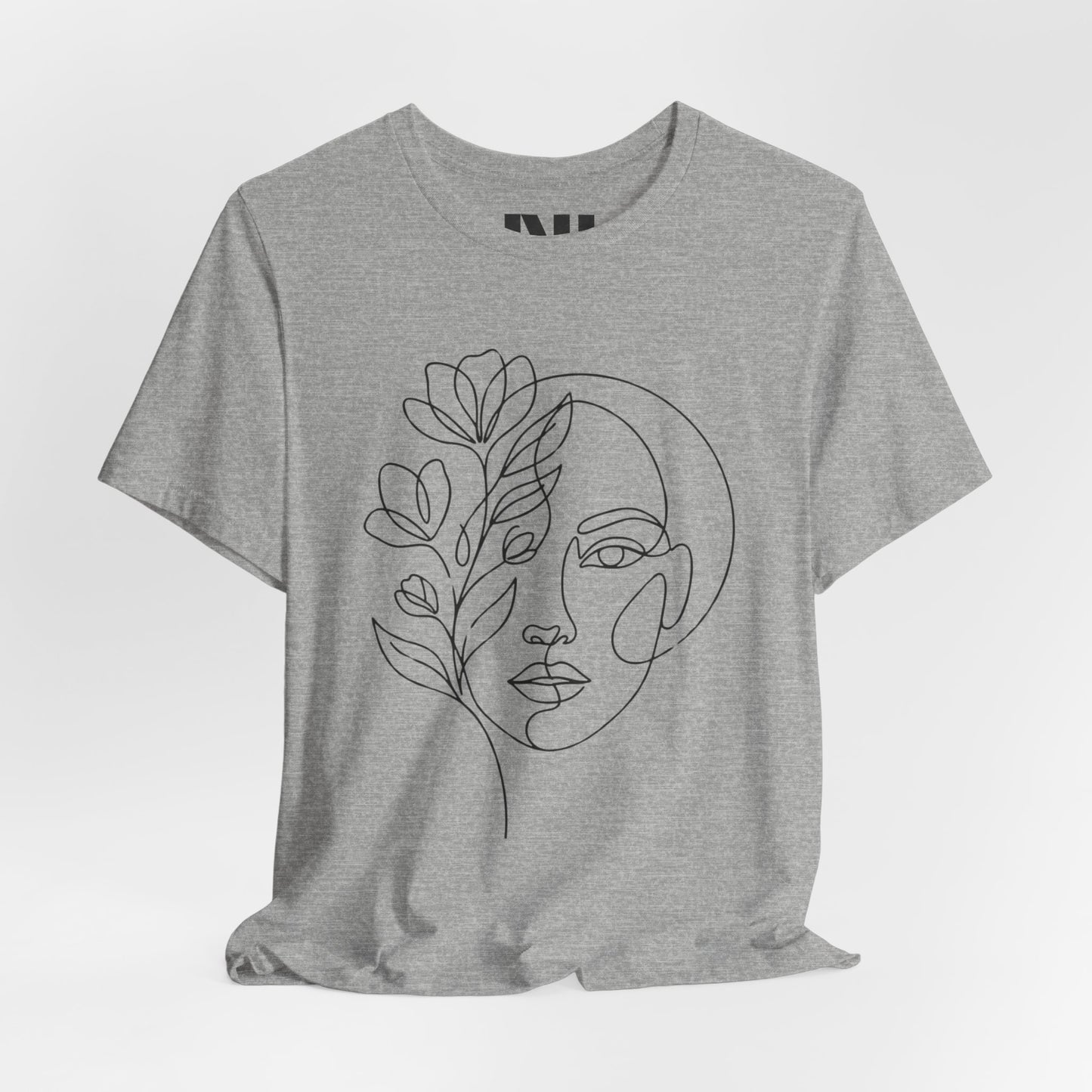 Grey Heathered graphic t-shirt featuring a minimalist black continuous line art design of a woman's face blooming with floral botanical elements. MOEBEER tees #Athletic Heather