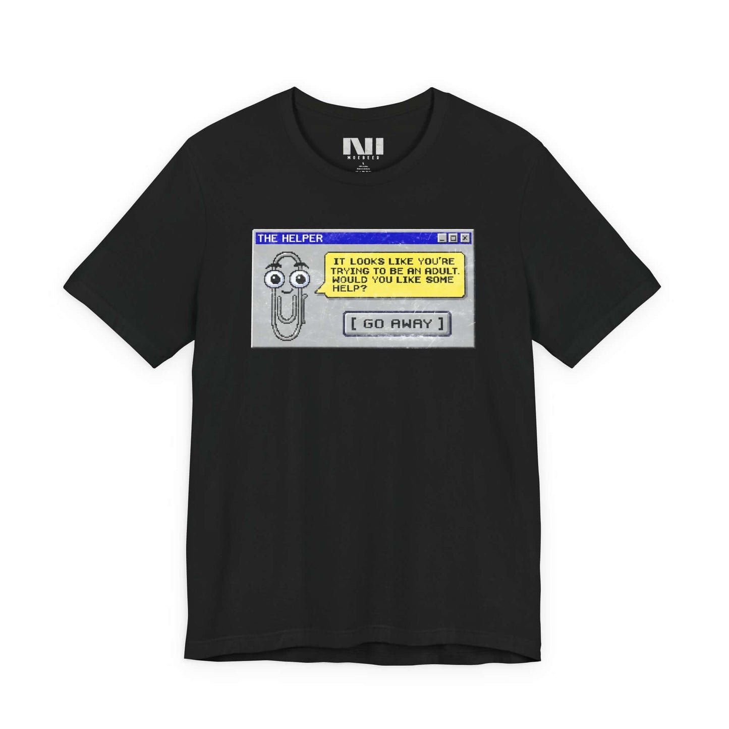 Black t-shirt featuring a retro pixelated computer pop-up window graphic with a cartoon paperclip assistant. The text within the window reads, "IT LOOKS LIKE YOU'RE TRYING TO BE AN ADULT. WOULD YOU LIKE SOME HELP?" followed by a button that says "[ GO AWAY ]" #Black