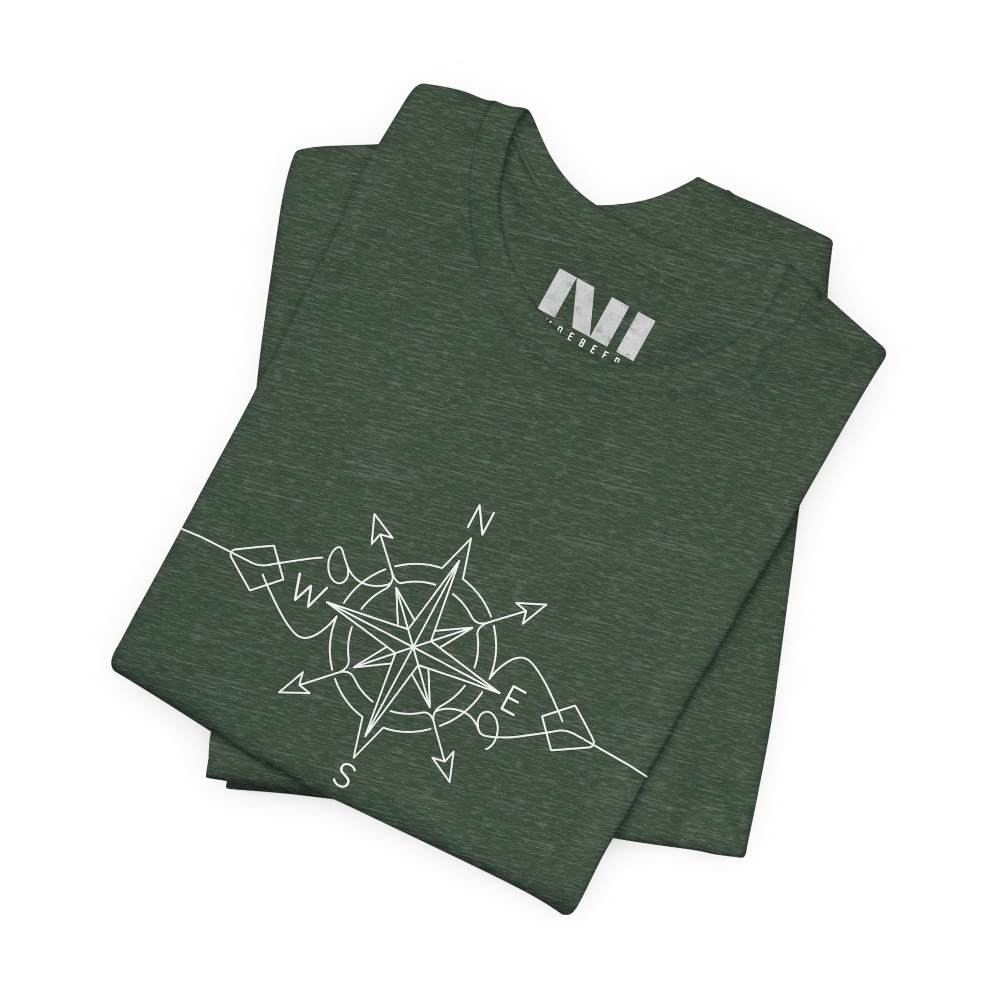 folded heather forest green color graphic t-shirt featuring a minimalist white line art compass rose design with cardinal direction markers. #Heather Forest