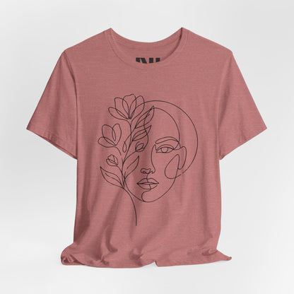 Mauve Heathered graphic t-shirt featuring a minimalist black continuous line art design of a woman's face blooming with floral botanical elements. MOEBEER tees #Heather Mauve