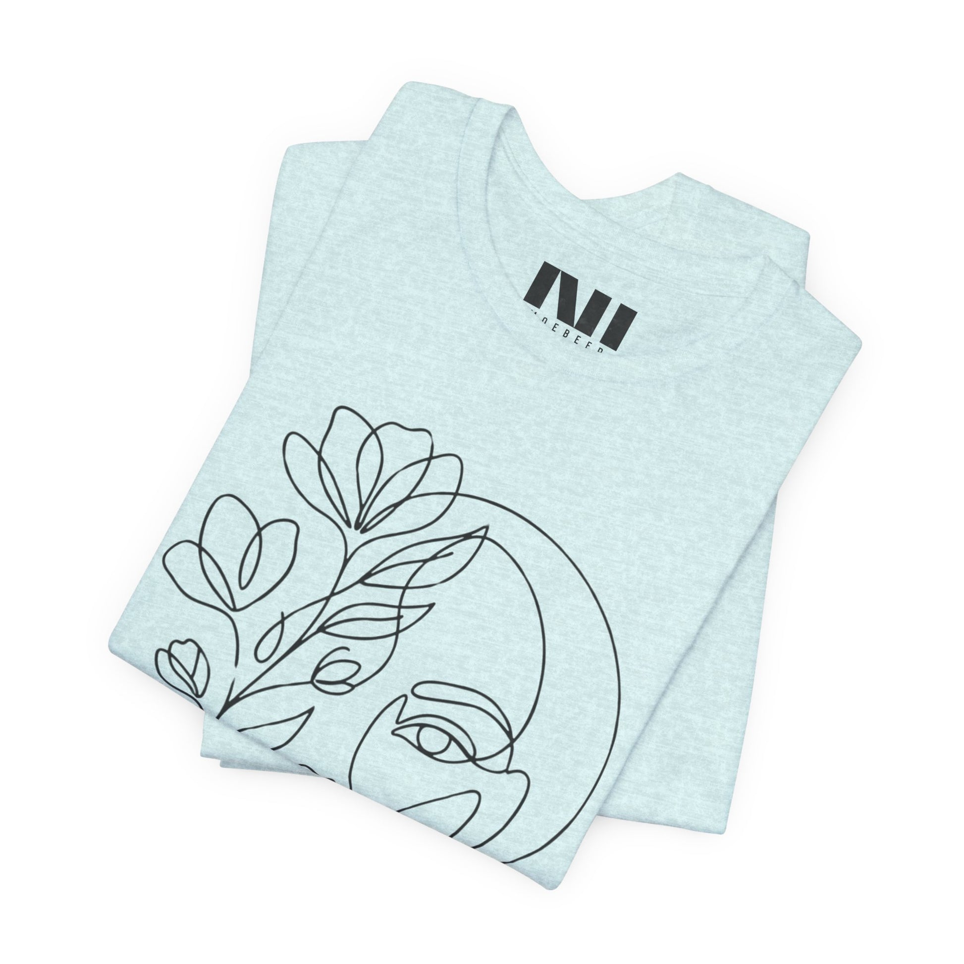 Folded Prism Ice Blue Heathered graphic t-shirt featuring a minimalist black continuous line art design of a woman's face blooming with floral botanical elements. MOEBEER tees #Heather Prism Ice Blue