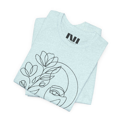 Folded Prism Ice Blue Heathered graphic t-shirt featuring a minimalist black continuous line art design of a woman's face blooming with floral botanical elements. MOEBEER tees #Heather Prism Ice Blue