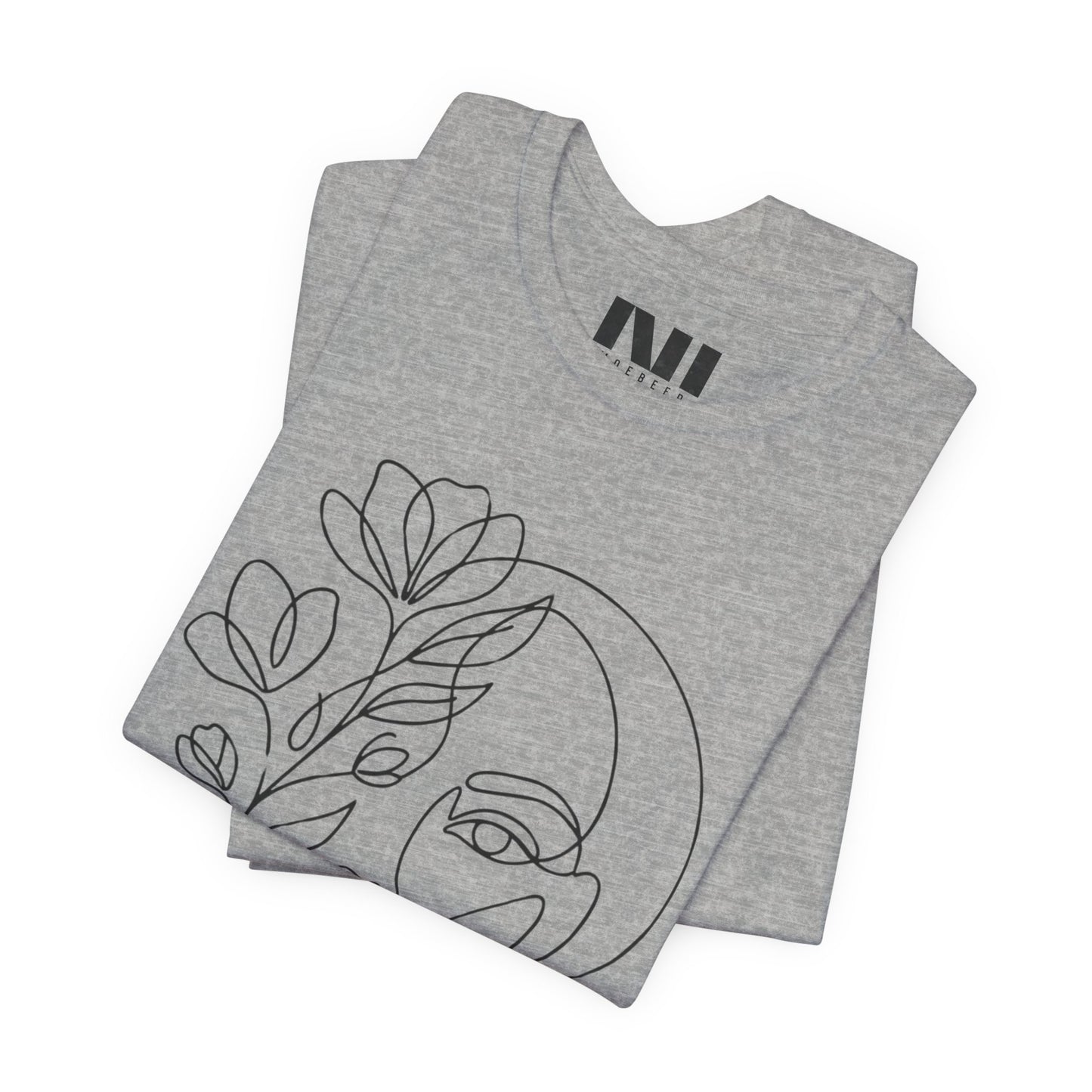 Folded Grey Heathered graphic t-shirt featuring a minimalist black continuous line art design of a woman's face blooming with floral botanical elements. MOEBEER tees #Athletic Heather