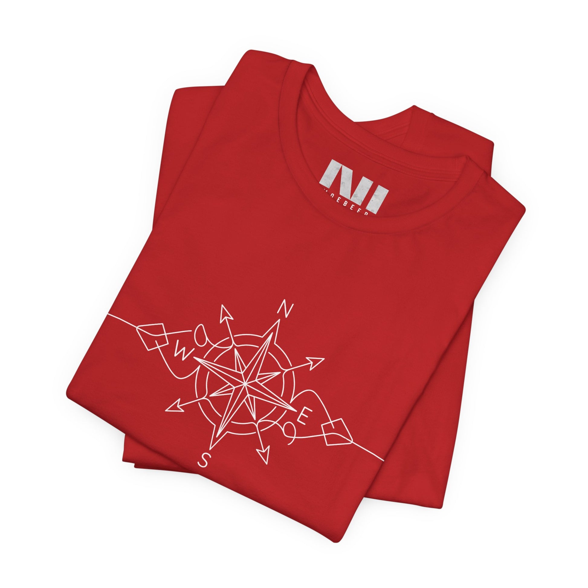 folded red color graphic t-shirt featuring a minimalist white line art compass rose design with cardinal direction markers. #Red