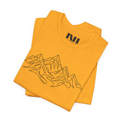 folded mustard graphic t-shirt featuring a minimalist white continuous line art design of a mountain range, moebeer tees #Gold