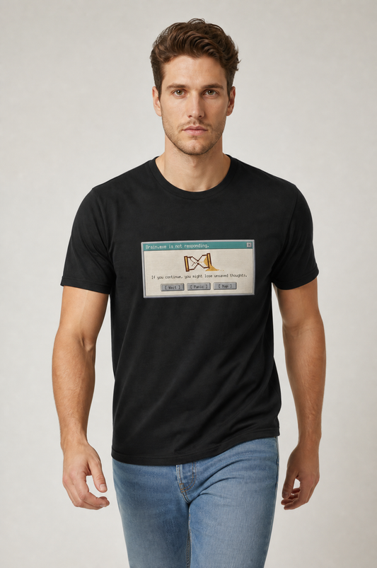 Man wearing a black t-shirt with a graphic design on a plain background #Black