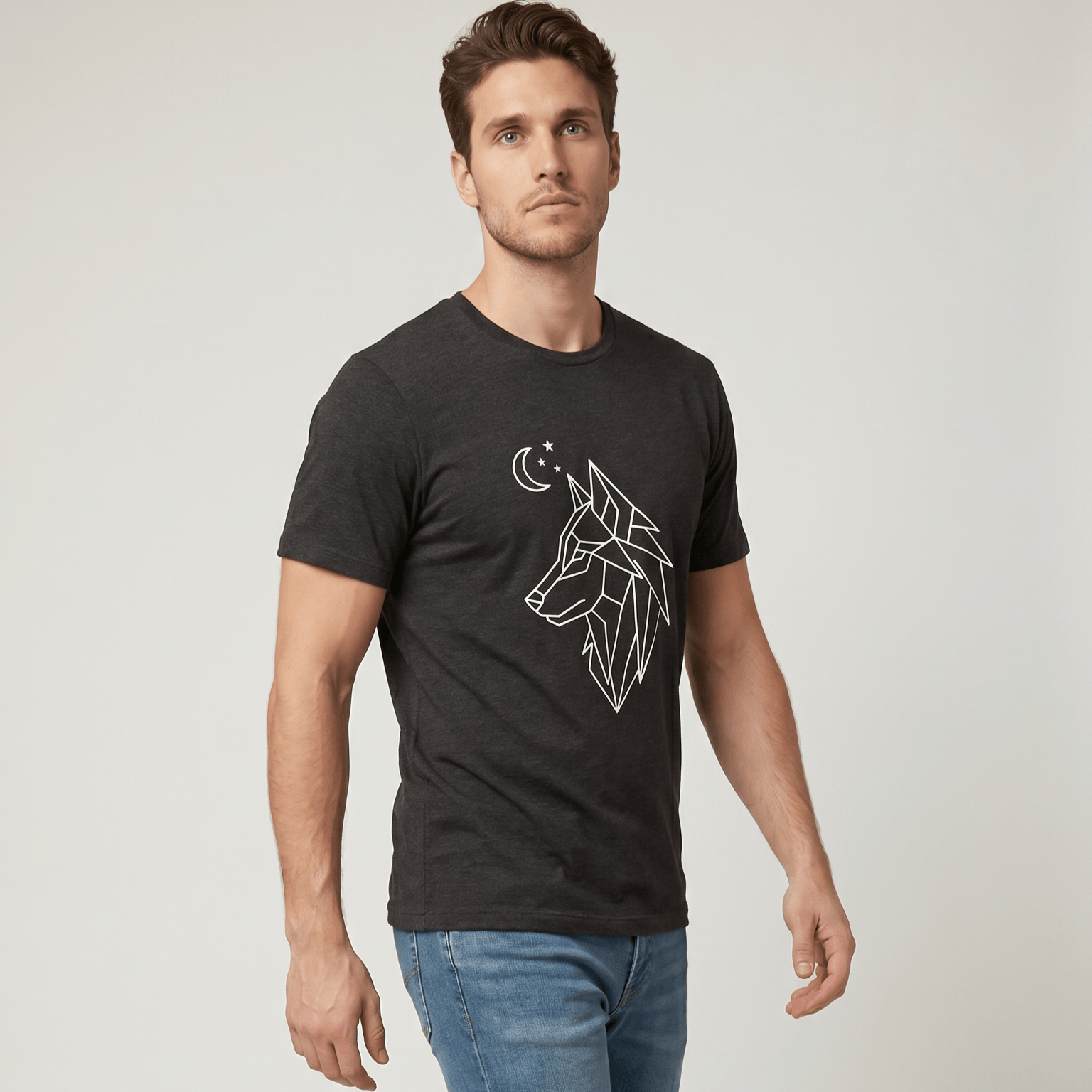 Man wearing a black t-shirt with a geometric wolf design on a plain background #Dark Grey Heather