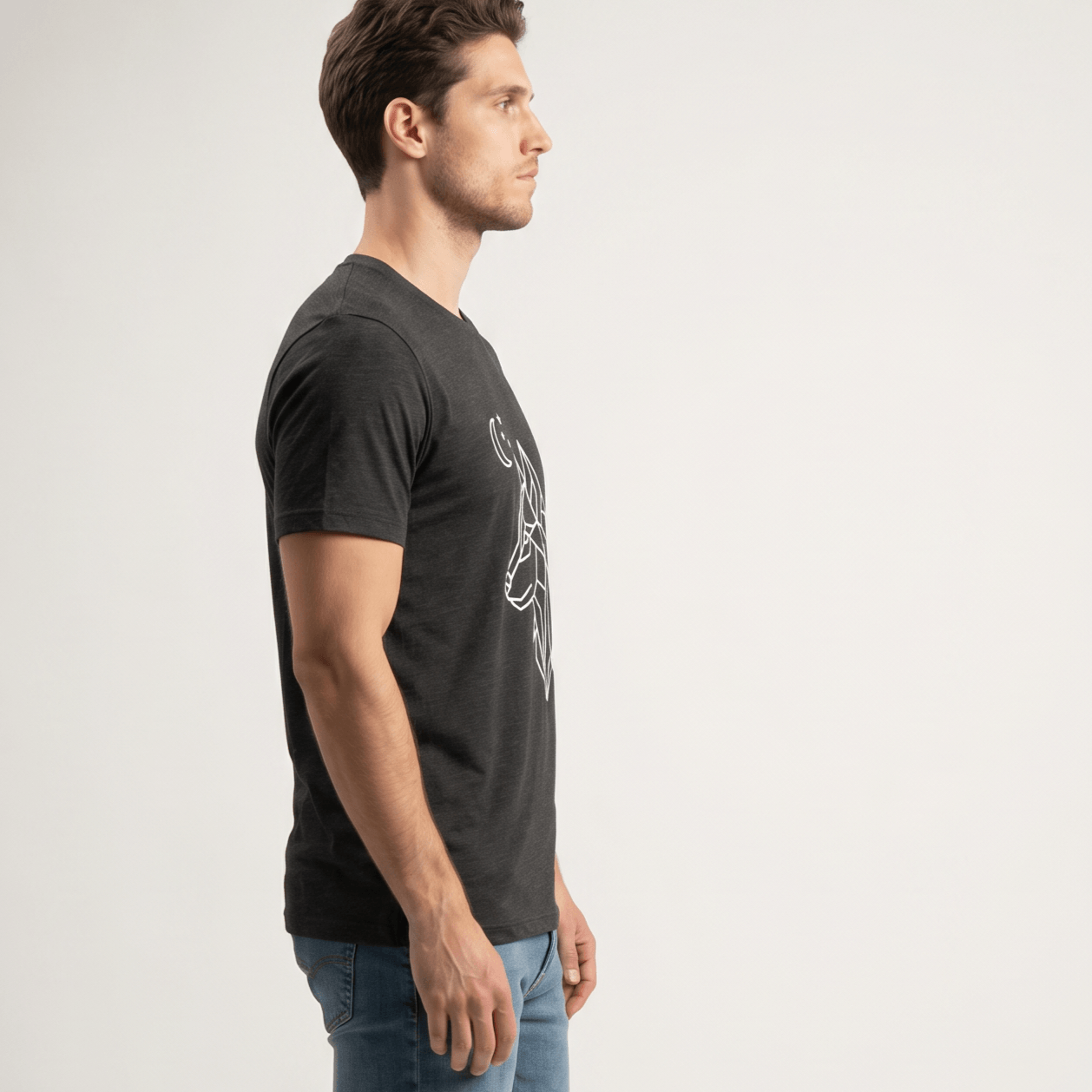 Man wearing a black t-shirt with a white graphic on a light gray background #Dark Grey Heather