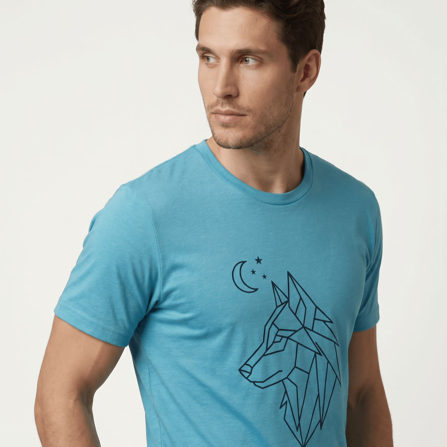 Man wearing a blue t-shirt with a geometric wolf design on a light gray background #Heather Aqua