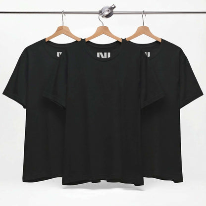 Tailored fit black t-shirt displayed on hangers, showcasing a classic black tee design in 100% cotton.