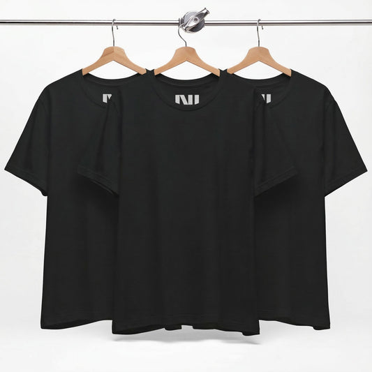 Tailored fit black t-shirt displayed on hangers, showcasing a classic black tee design in 100% cotton.