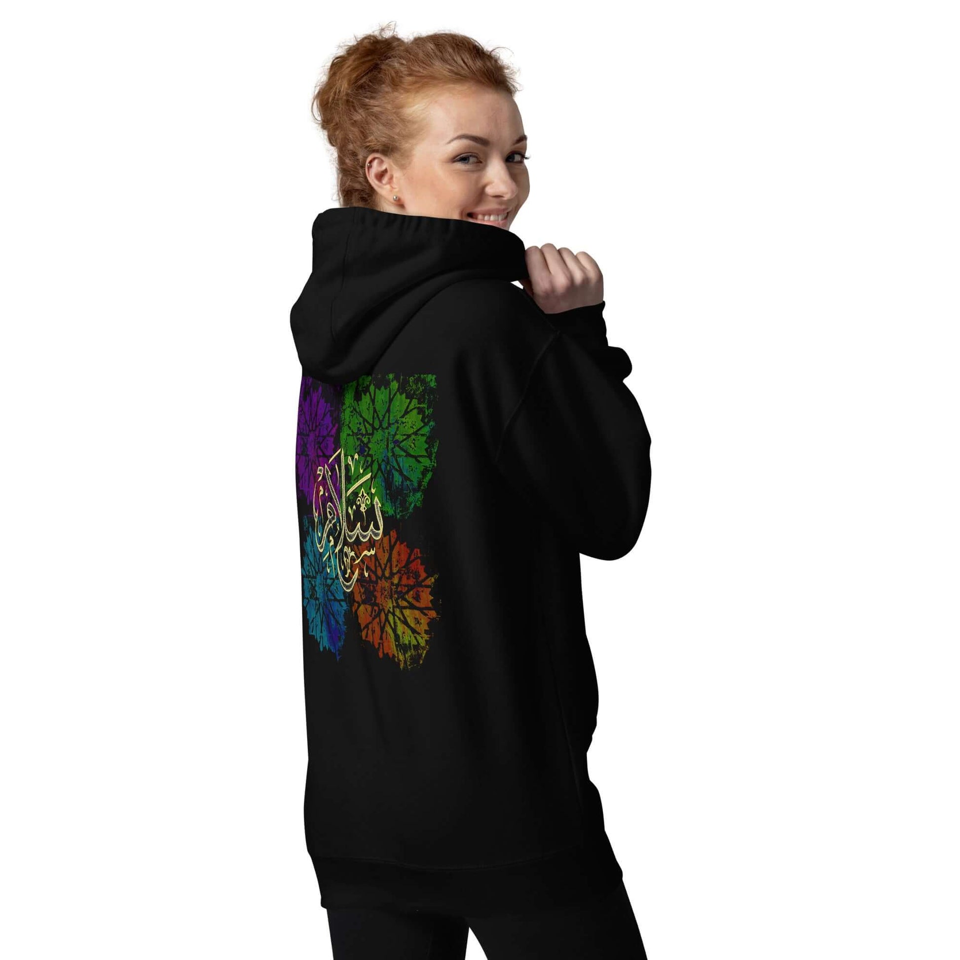 Woman wearing an Arabic calligraphy hoodie graphic hoodie with colorful design on the back #Black 