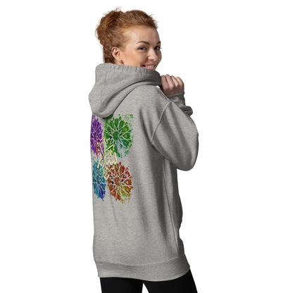 Model wearing a grey Arabic calligraphy hoodie with a colorful design on the back, showcasing cultural identity. #Carbon Grey
