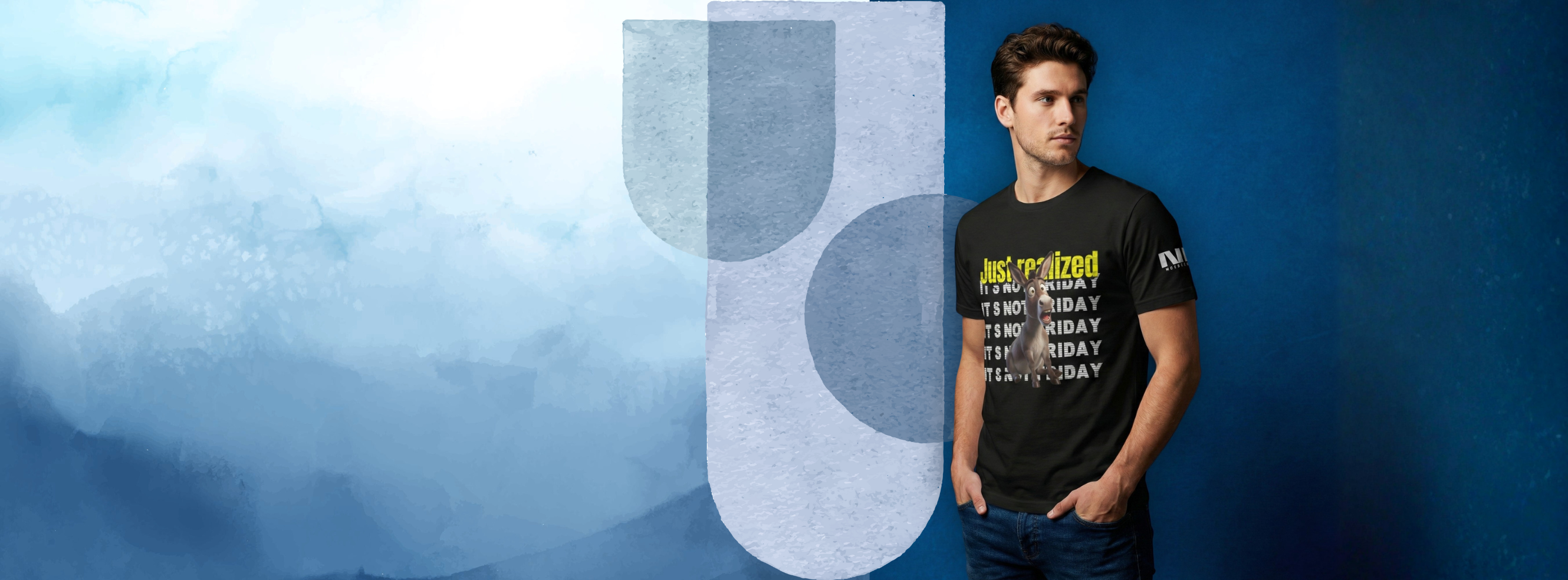 Person wearing a black t-shirt with text design against a blue and gray background