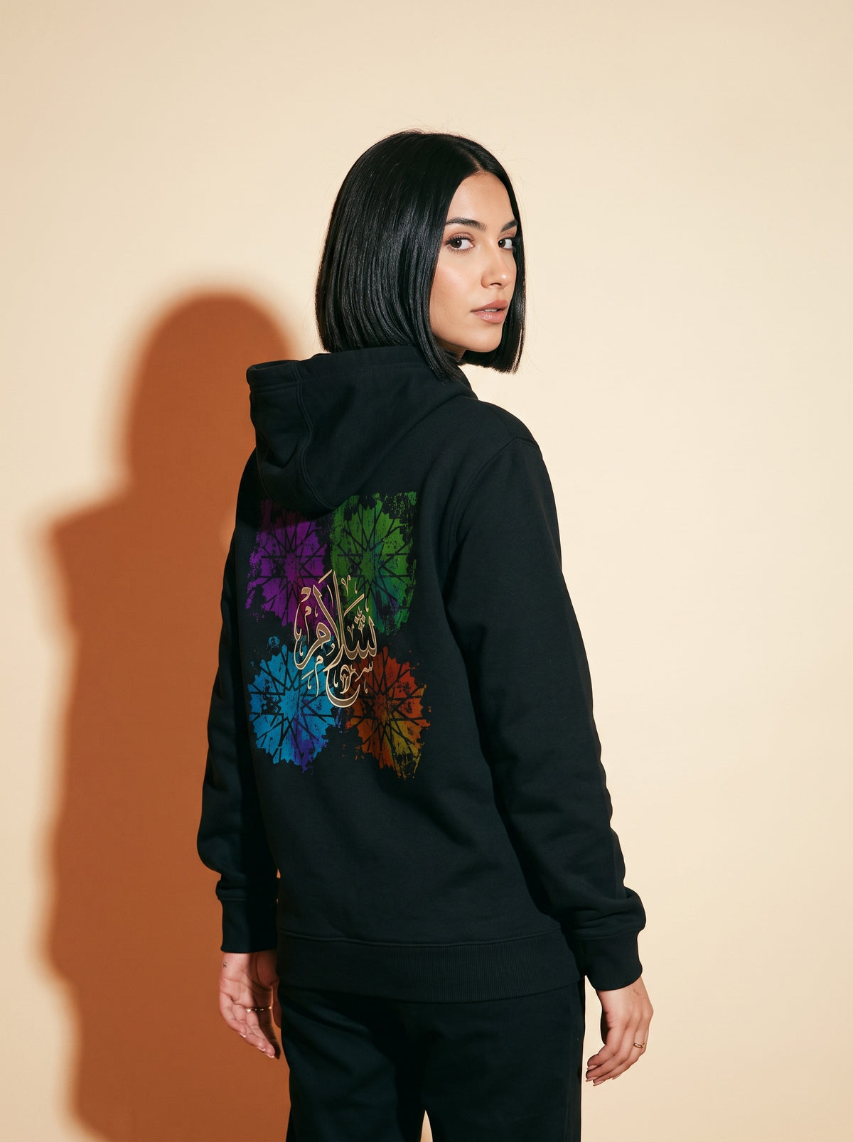 The Salam Unisex Hoodie worn on the body - MOEBEER lookbook 1