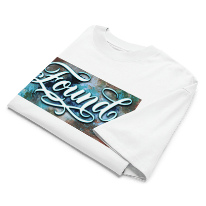 White oversized MOEBEER t-shirt featuring "Found" script over a colorful abstract paint design #White